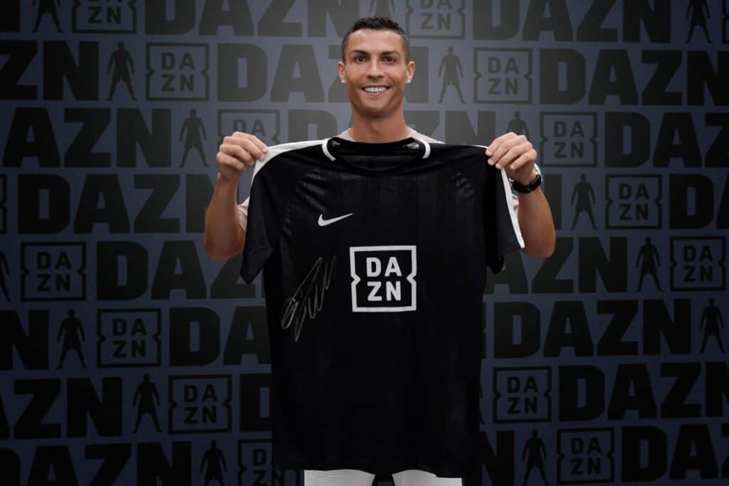 cristiano ronaldo holding the DAZN logo t shirt
